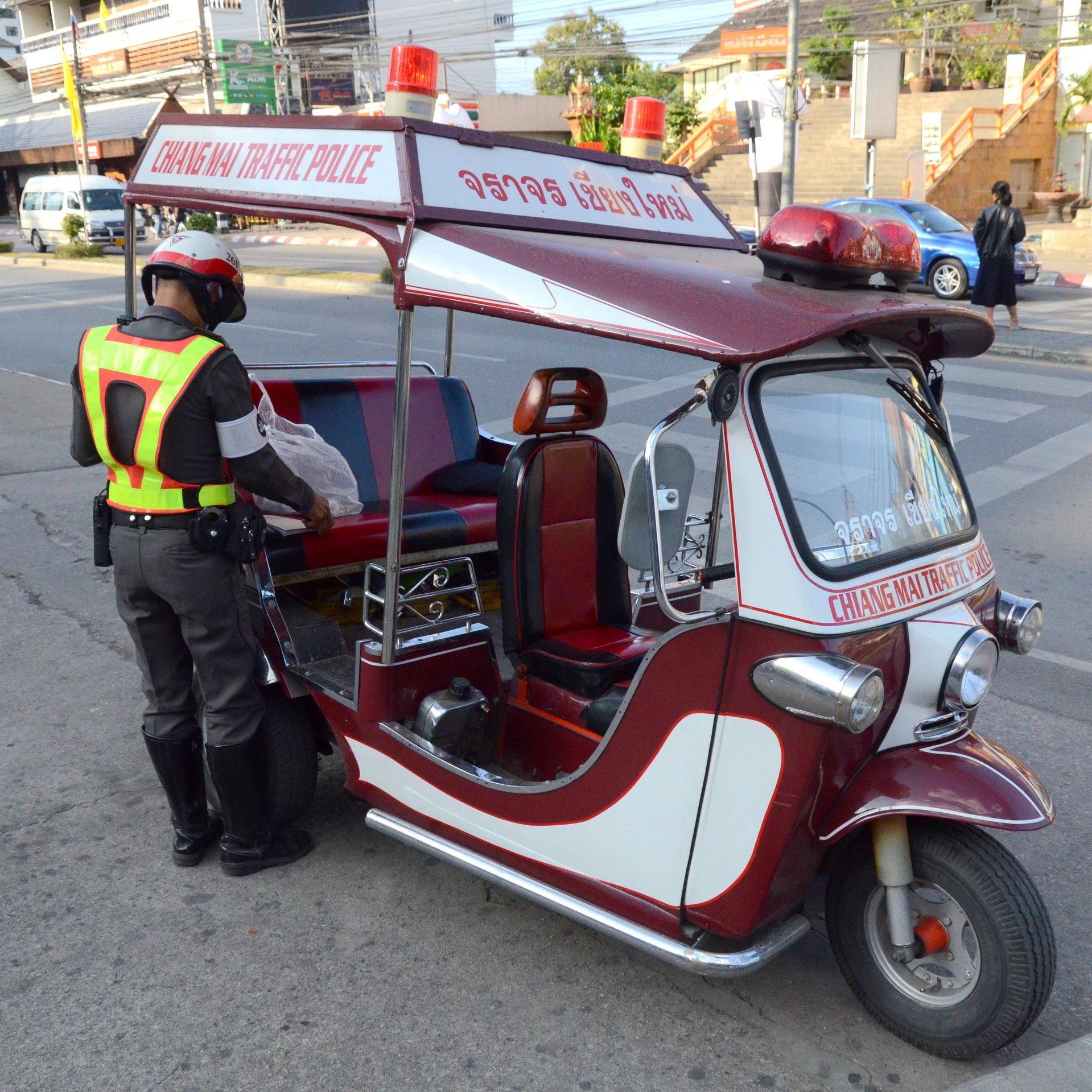 A ride-hailing vehicle in Chiang Mai traffic