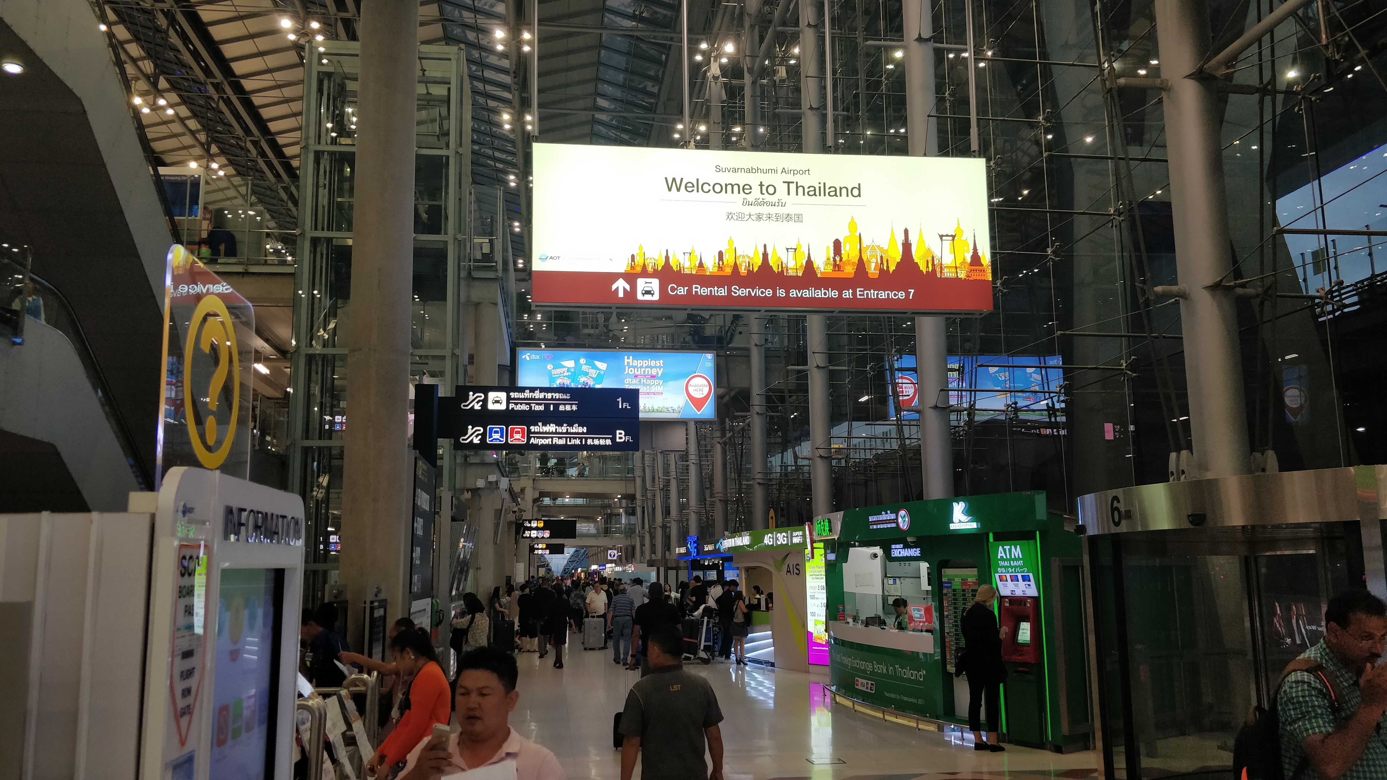 Travelers waiting at Thai immigration passport control