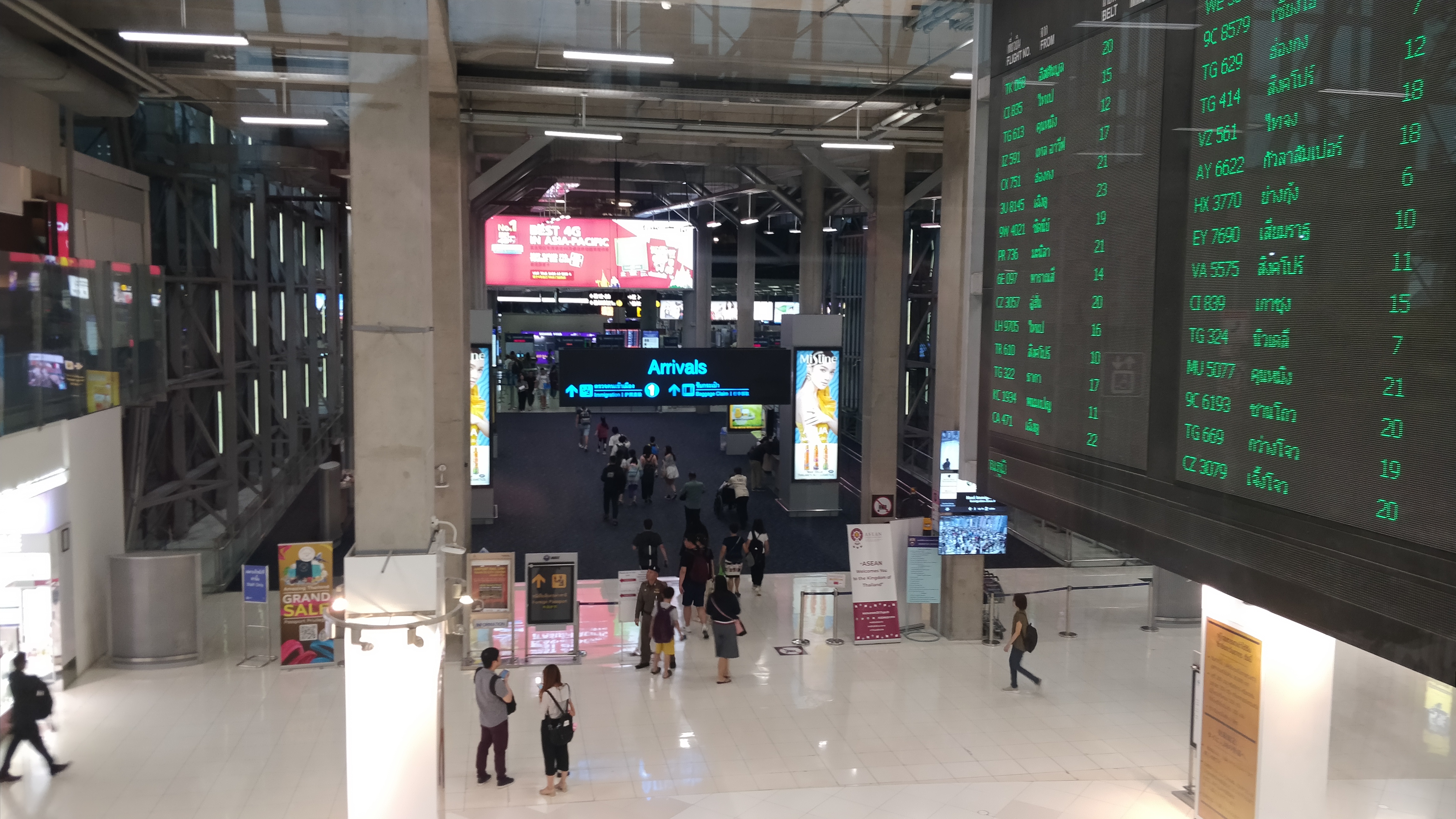 Travelers waiting at Thai immigration counters